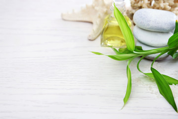 Beautiful composition of spa treatment on wooden table