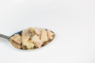 chicken ripe in the spoon/ isolated on white.