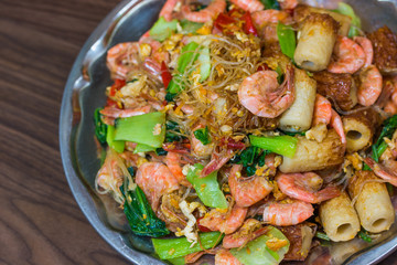 Shrimp fried vermicelli and vegetables close-up on the table/ to