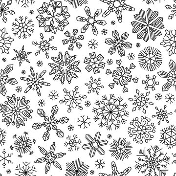 Seamless linear snowflakes pattern.