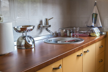 Fototapeta premium Detail of orange kitchen