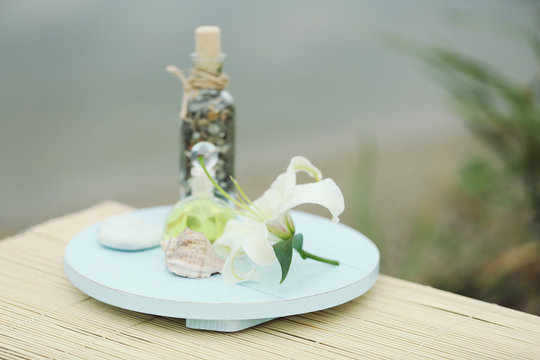 Tray with spa products on nature background