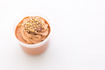 Ice cream chocolate in transparent plastic cups.