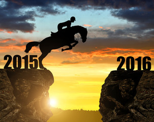 The rider on the horse jumping into the New Year 2016