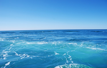 Blue sea and blue sky background