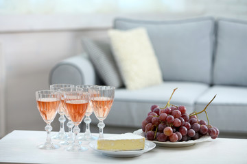 Table at home with food and drinks for friends