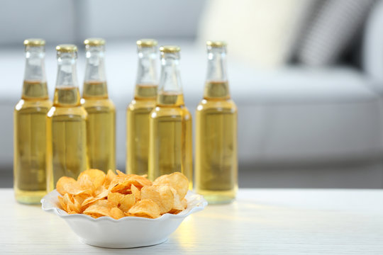 Table at home with chips and drinks for friends