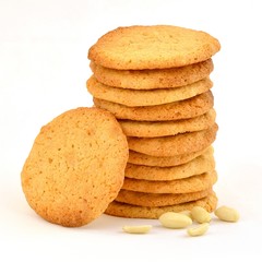 Neat stack of homemade peanut butter cookies with one resting against it and scattered peanuts. On a white background.