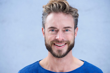 Fototapeta premium Close up portrait man with beard smiling