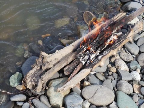 Bonfire on the bank of the river.