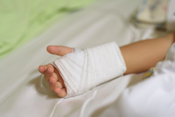 Boy hand with IV solution