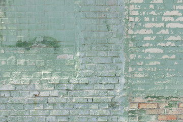 Vintage street brick background. Weathered texture of stainted old brik wall. Grunge rusty blocks. Urban wallpaper. Nature artistic texture. 