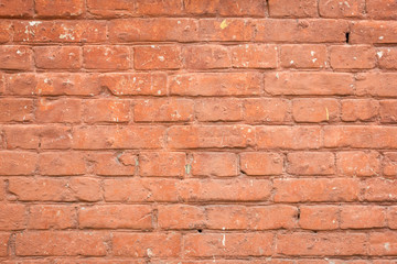 old red brick wall background. brick wall texture. grunge wallpaper. 