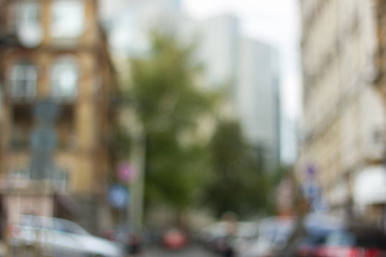 Blurred background photo. Cityscape bokeh. Blurry european street