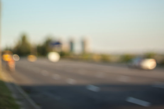 Blurred background photo.Cityscape bokeh. Defocused abstract city.Background out of focus.Can use as wallpaper, design. Summer blurry city backdrop.Travel out of focus photos. Fairy defocused photos. 