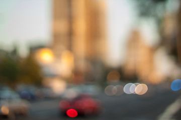 Blurred background photo.Cityscape bokeh. Defocused abstract city.Background out of focus.Can use as wallpaper, design. Summer blurry city backdrop.Travel out of focus photos. Fairy defocused photos. 