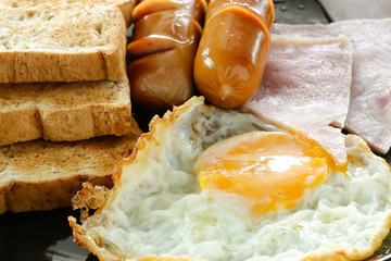 Breakfast set with ham, egg,bread and sausage