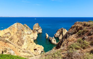 Fototapeta na wymiar Ocean with rocky cliffs