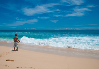 Naklejka premium Waves on the beach Balangan, Bali, Indonesia. April 2014. This beach is one of the most beautiful in Bali