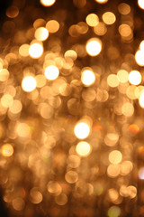 Obraz premium glitter vintage lights background. gold, silver, and black. de-focused. 