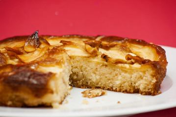 Apple pie on a white plate