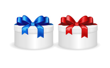 Gift round box with red and blue ribbon and bow. Christmas gift. 