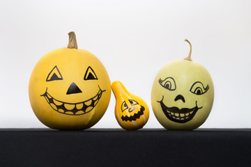 pumpkins with painted faces