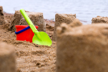 Sand castle / Sand castle with sand toys on water
