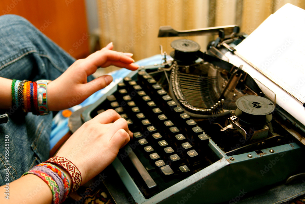 Fototapete typing text with an old typemachine