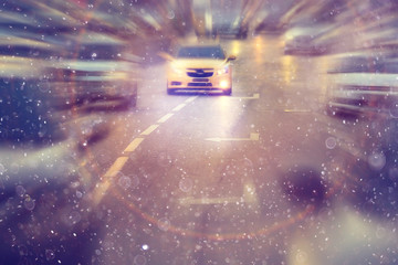 Obraz na płótnie Canvas Night traffic car road blur light snow