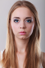 Naklejka premium Closeup portrait of blonde long hair girl