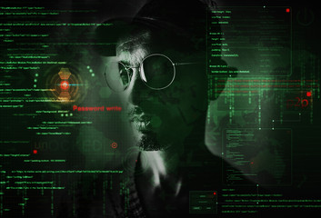 hacker at work with graphic user interface around
