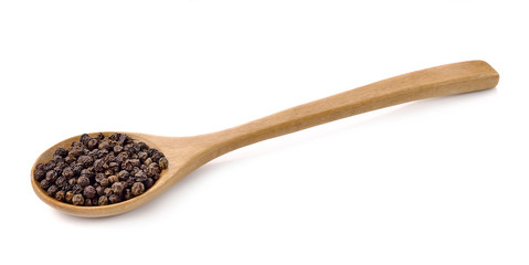 Wooden spoon and peppercorn on white background