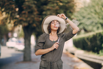 Fototapeta premium Girl with E-cigarette