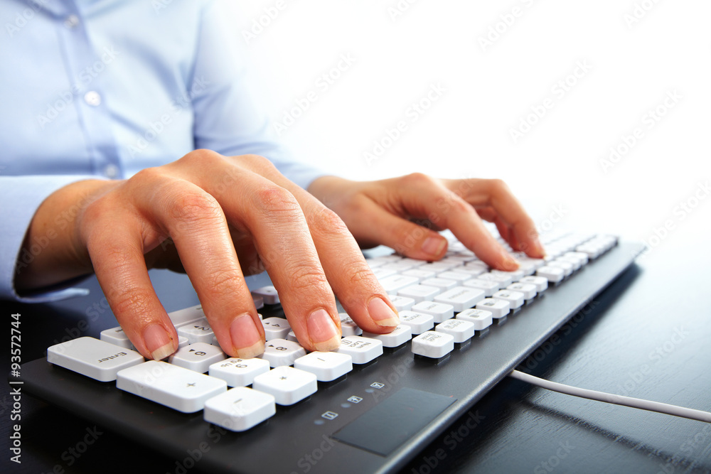Leinwandbilder hands typing on computer keyboard.