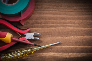 Composition of insulated screwdrivers nippers insulation tape el