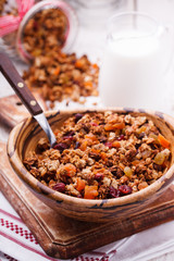 Granola from several types of cereals with nuts,honey,raisins