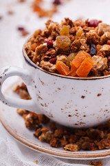Granola from several types of cereals with nuts,honey,raisins