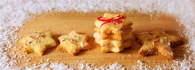 Christmas  cookies  isolated on wood background and snow.
