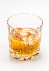 Glass of whiskey and ice 