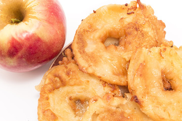 Fried apples with fresh apple.