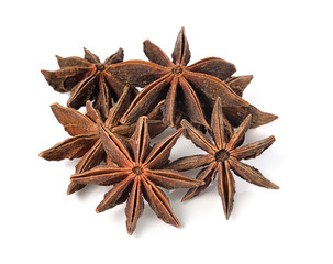 Star anise spice fruits and seeds isolated on white background