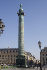 Fototapeta na wymiar Victory column in Place Vendome made to resemble Trajan's colume in Rome. Made from the bronze of 1250 cannon captured in the Battle of Austerlitz.Paris France