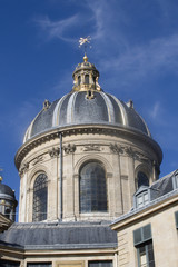 Fototapeta na wymiar Dome on the French Academy building.Paris, France