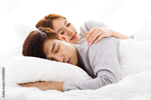 Happy Young Lovely Couple Lying In A Bed Stock Photo And