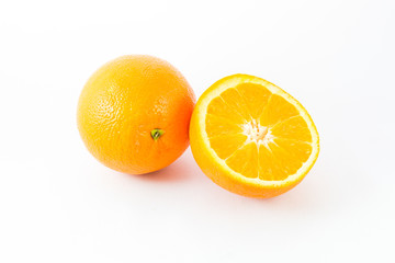 Orange fruit on white background, fresh and juicy.