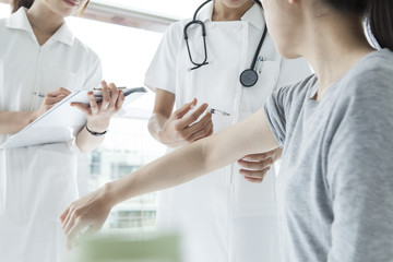 Nurses have hit the injection to the patient's arm