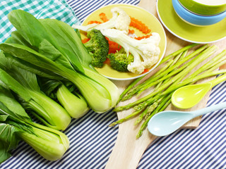 fresh vegetables on tablecloth still life background