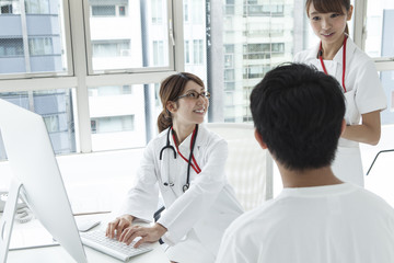Women doctors are examination of the patient