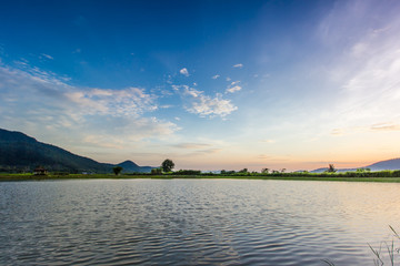 landscape with sunset over lake